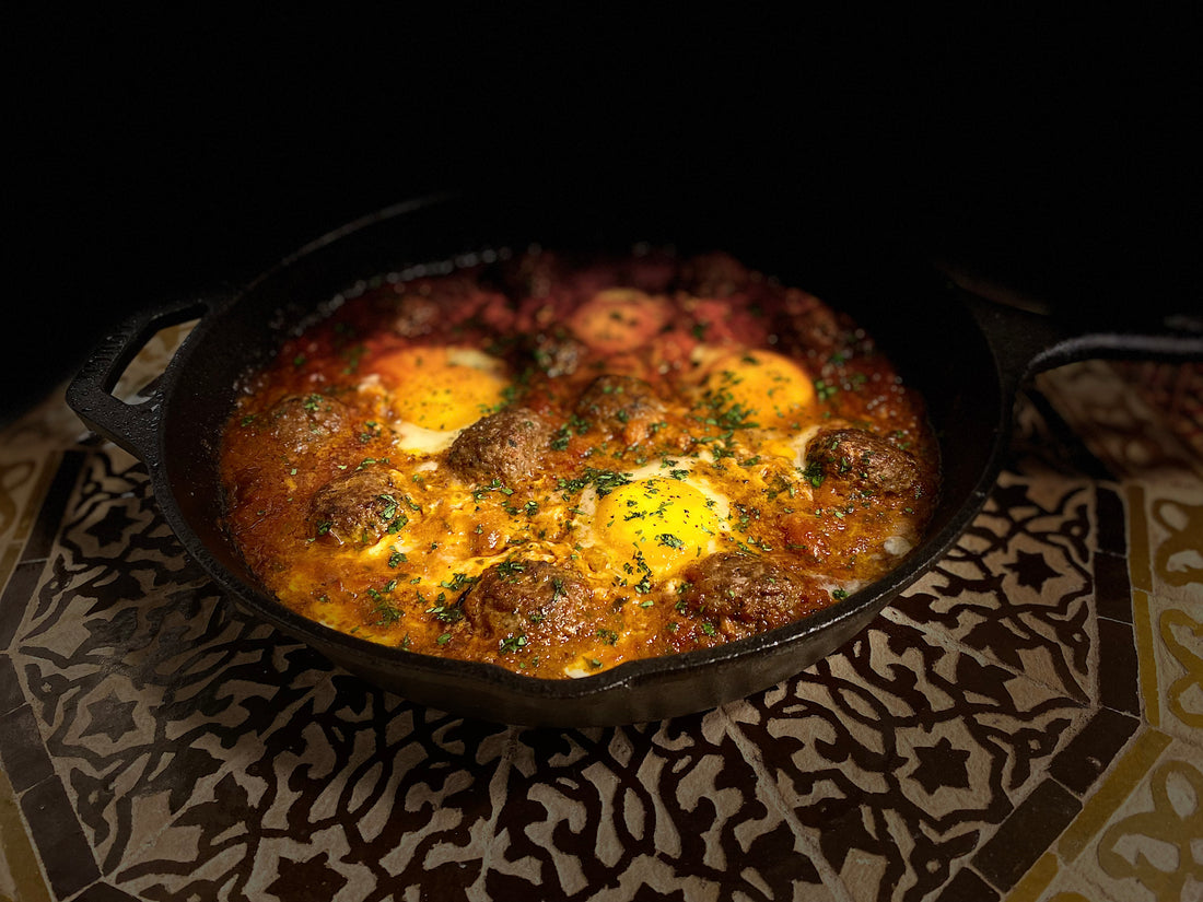 Meatball and tomato Tagine with eggs | Harissa